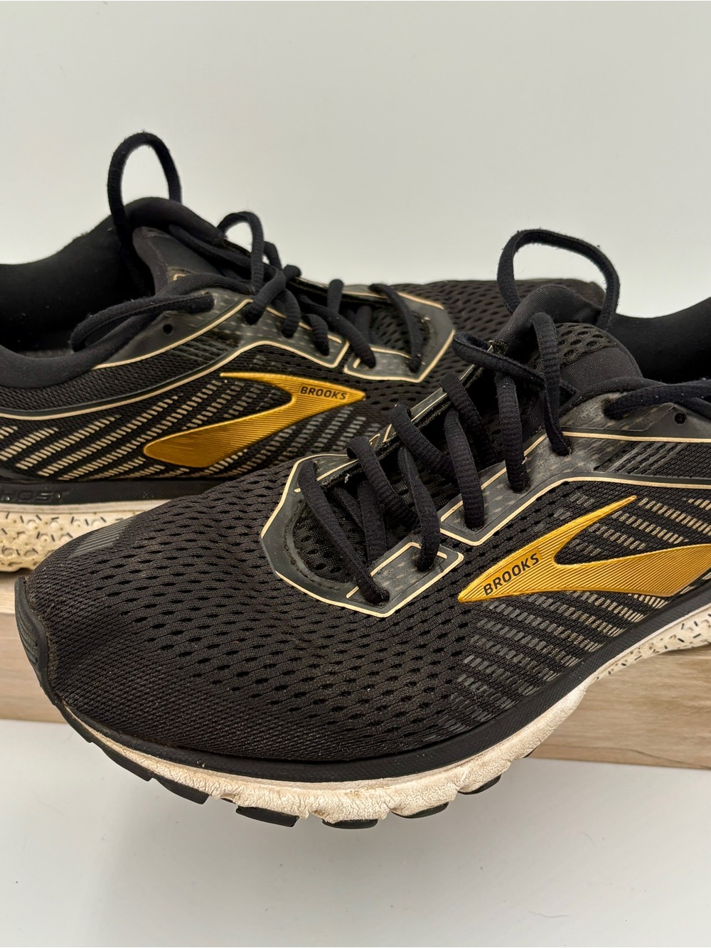 Brooks Black Running Shoes with Gold Accents